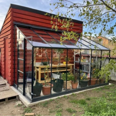 Serre adossée Prima 7,22m² en aluminium anthracite et verre trempé 4mm - Green Protect - Prix Destockage